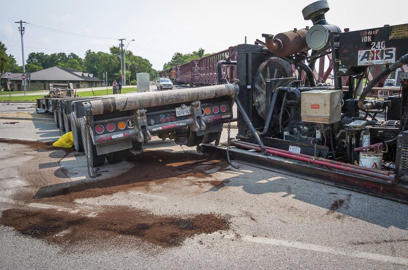 Train collides with semi at Crazy Corner; traffic tangled